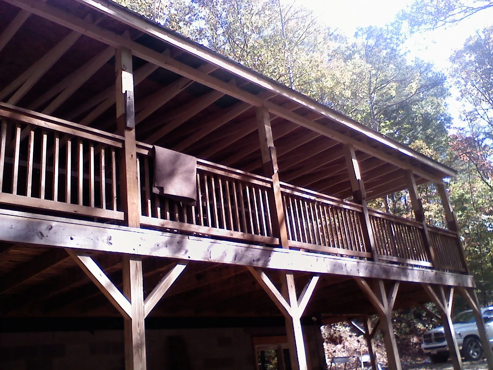Timber framing under a new elevated porch and deck — Roof Leak Repair in Machesney Park by Roofing Brothers